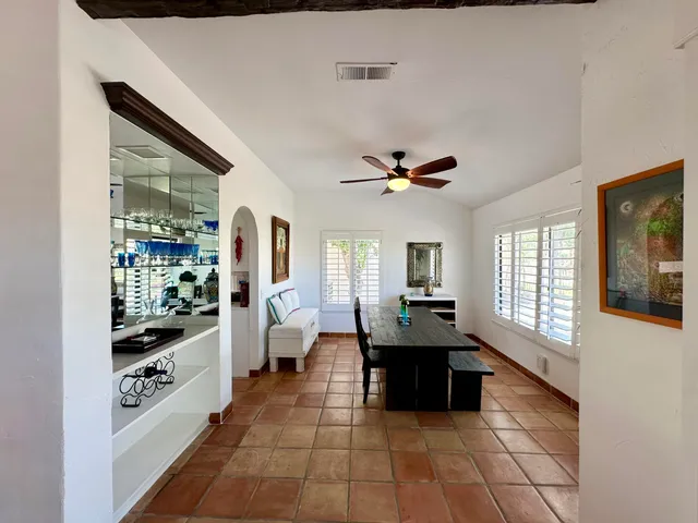 a large kitchen with a counter space a sink and appliances