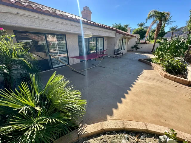 a house view with a outdoor space
