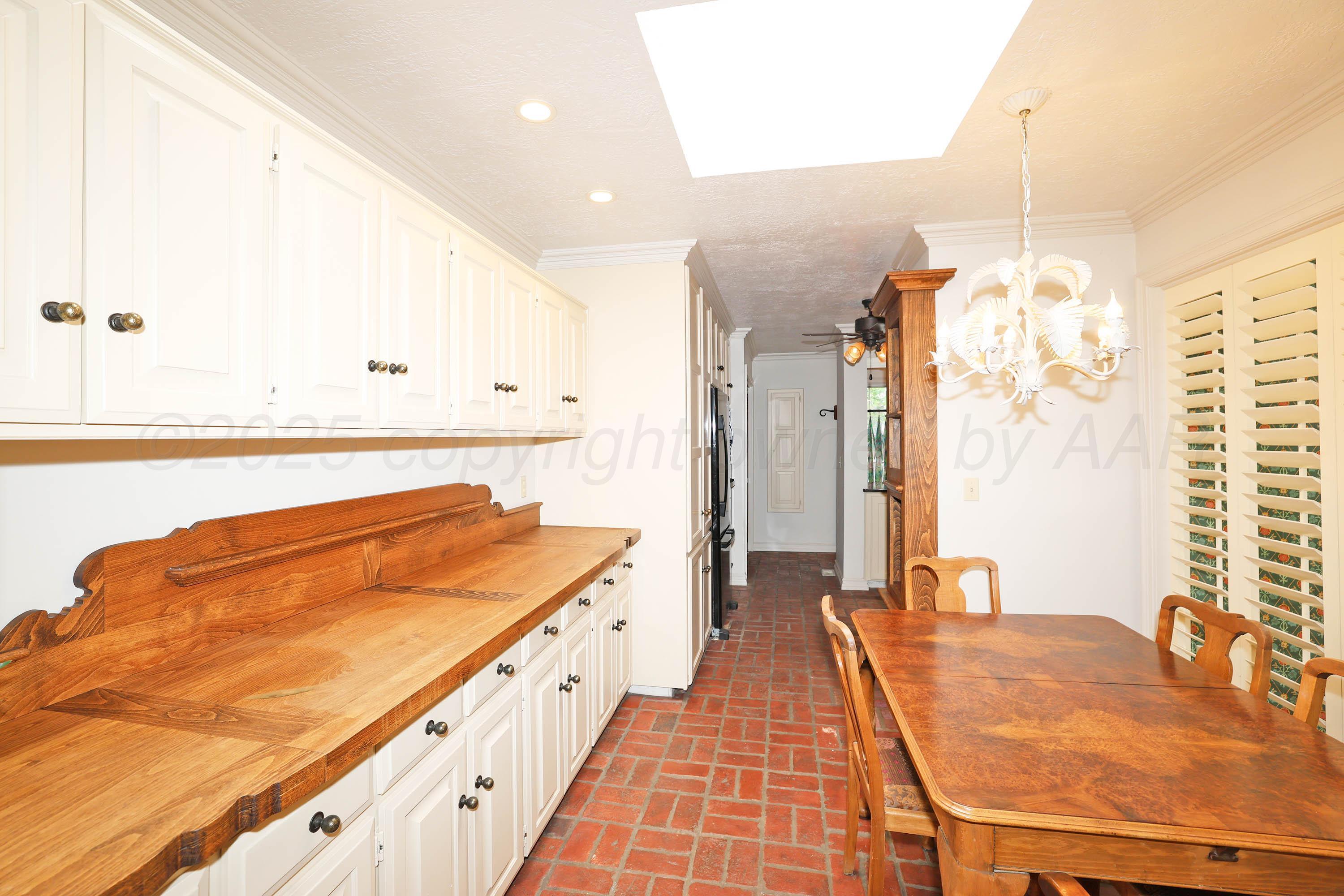 1615 South Bryan Street, Unit 19 Amarillo, TX 79102 - Photo 11 of 53 a bathroom with a tub sink and mirror