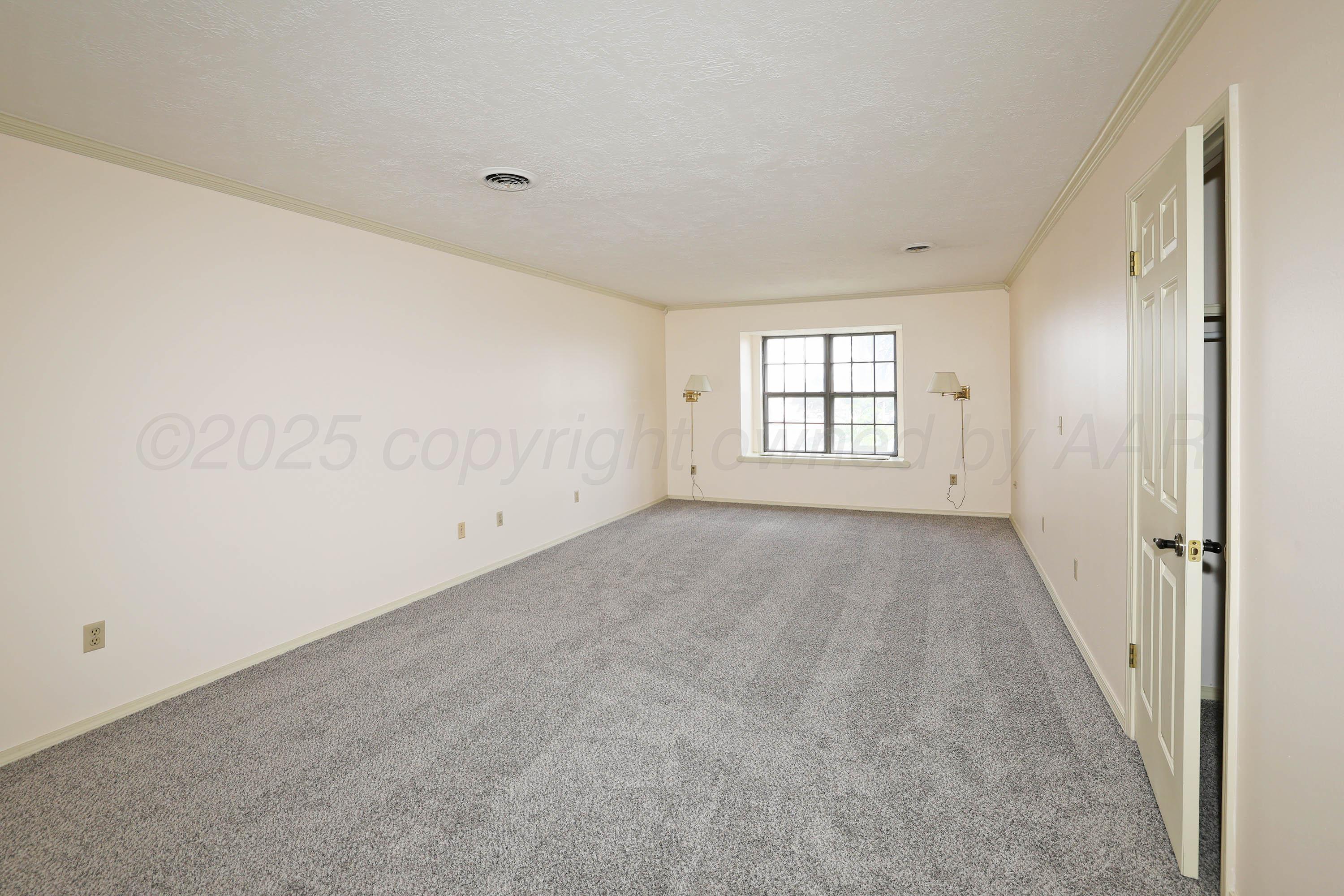 1615 South Bryan Street, Unit 19 Amarillo, TX 79102 - Photo 44 of 53 a view of an empty room with a window