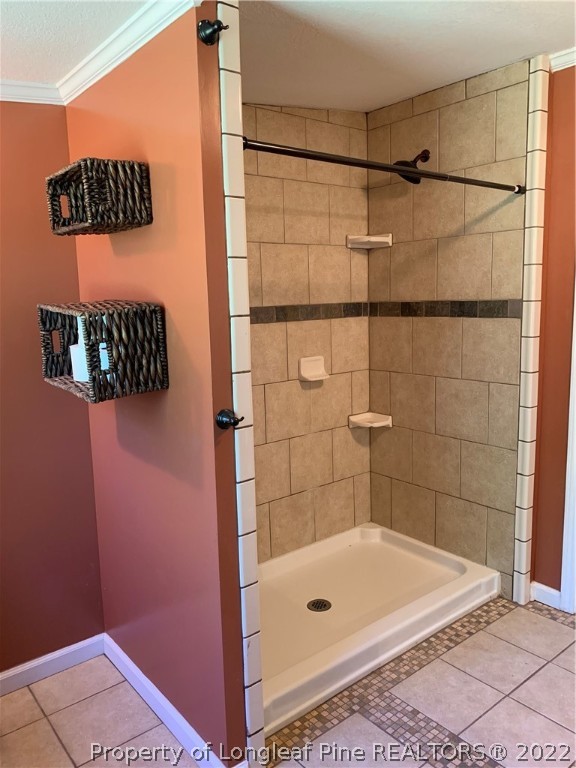228 L A Sandy Road Raeford, NC 28376 - Photo 23 of 36 a bathroom with a shower and a sink