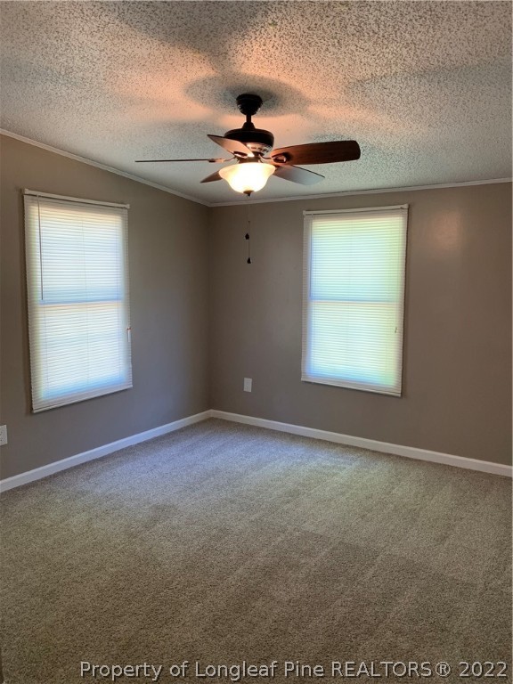 228 L A Sandy Road Raeford, NC 28376 - Photo 25 of 36 a view of an empty room with a window