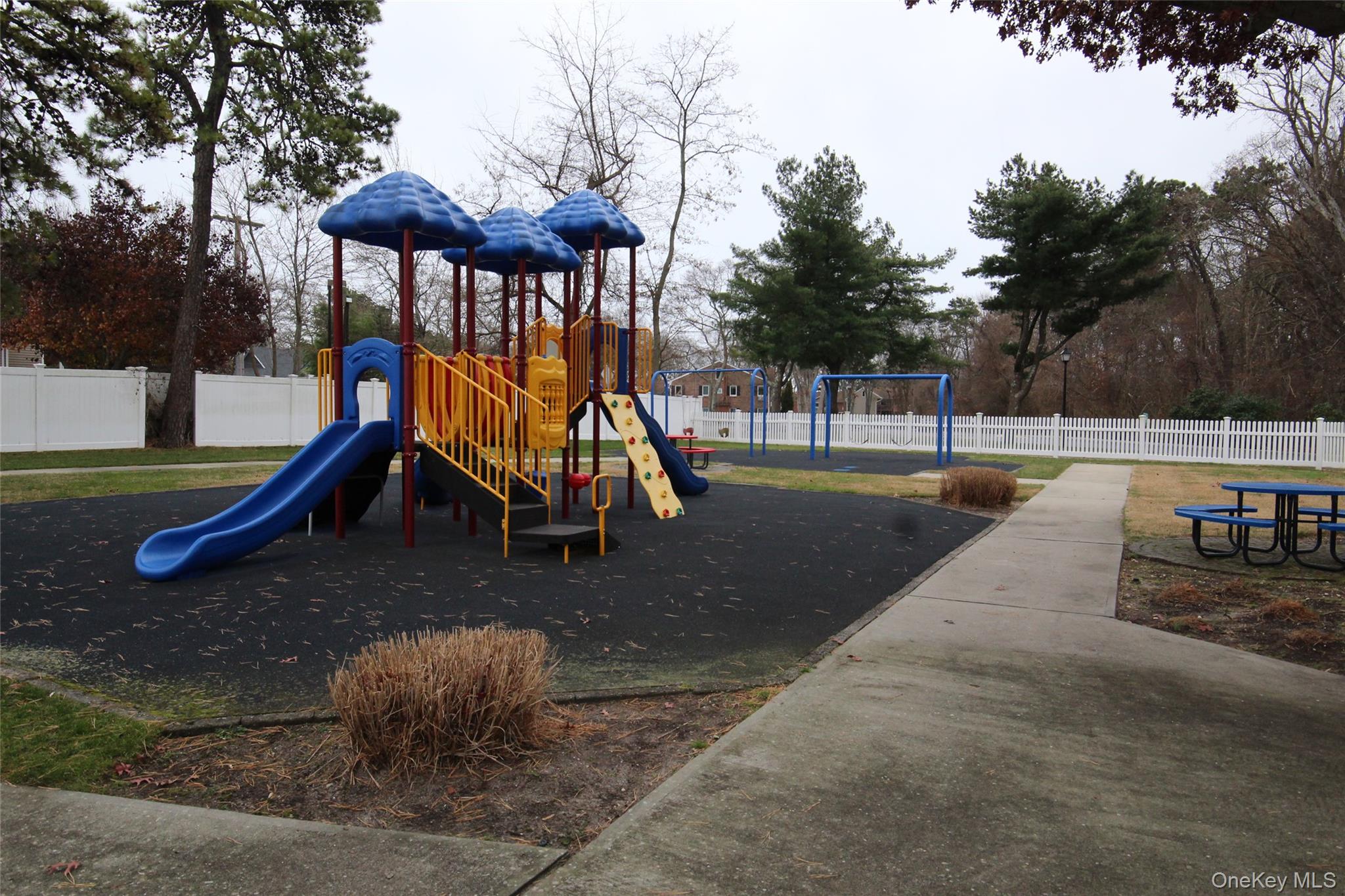 40 West 4th Street, Unit 149 Patchogue, NY 11772 - Photo 11 of 15 a view of a park with slide