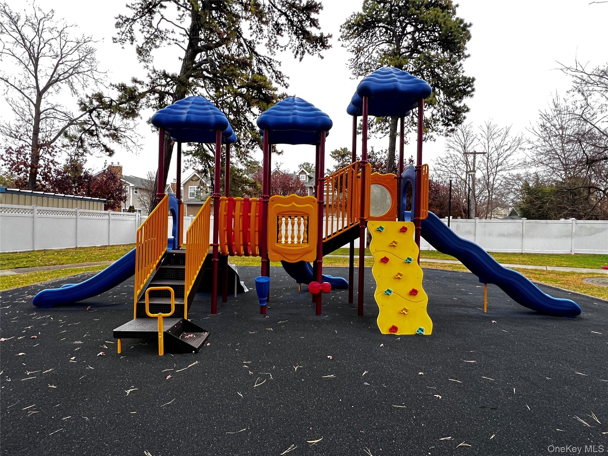 40 West 4th Street, Unit 149 Patchogue, NY 11772 - Photo 10 of 15 a small hurt is sitting in the middle of a park