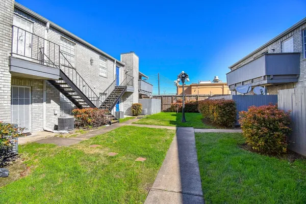 a view of a back yard of the house