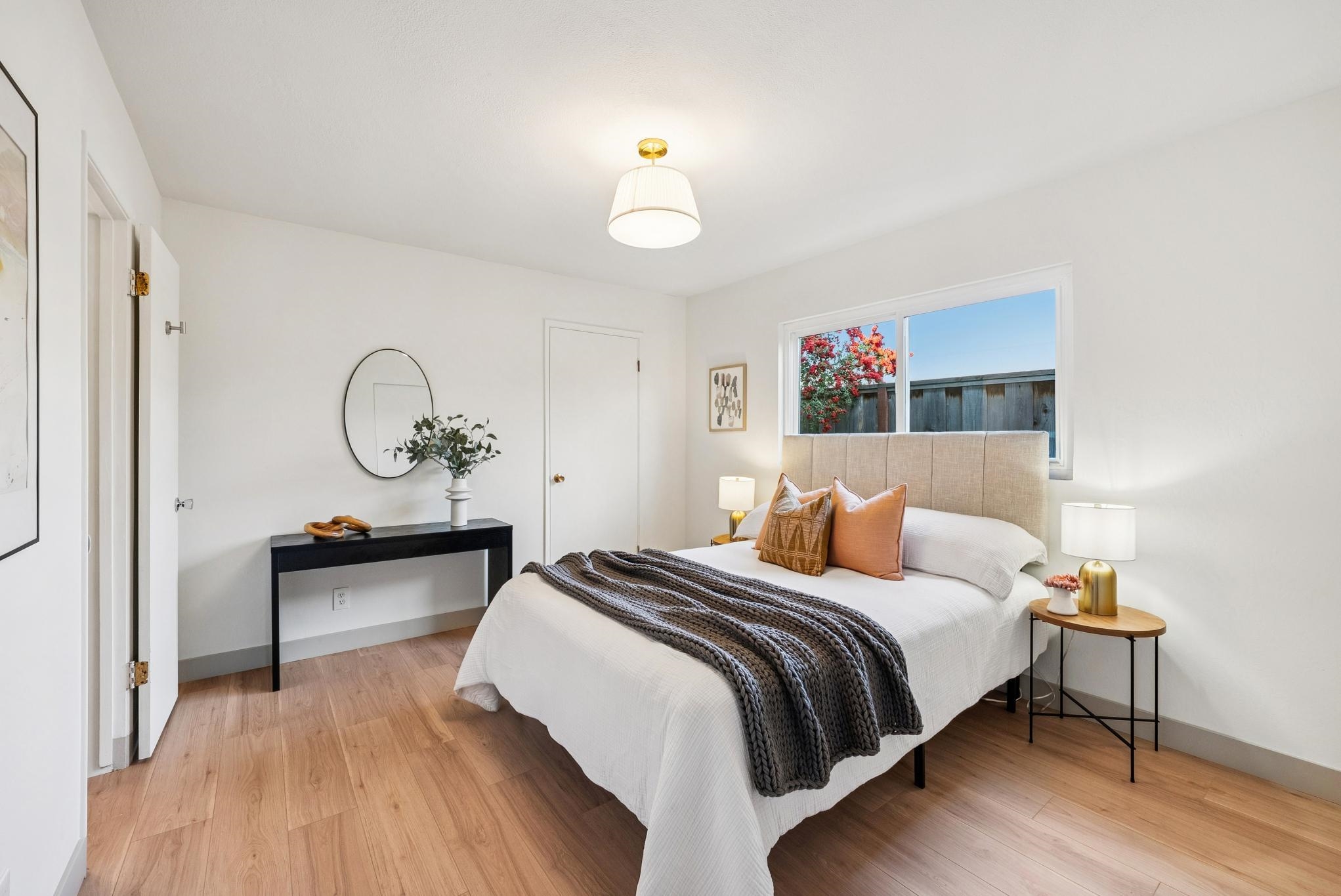 400 Harbor Light Road Alameda, CA 94501 - Photo 22 of 58 a bedroom with a bed and a chandelier