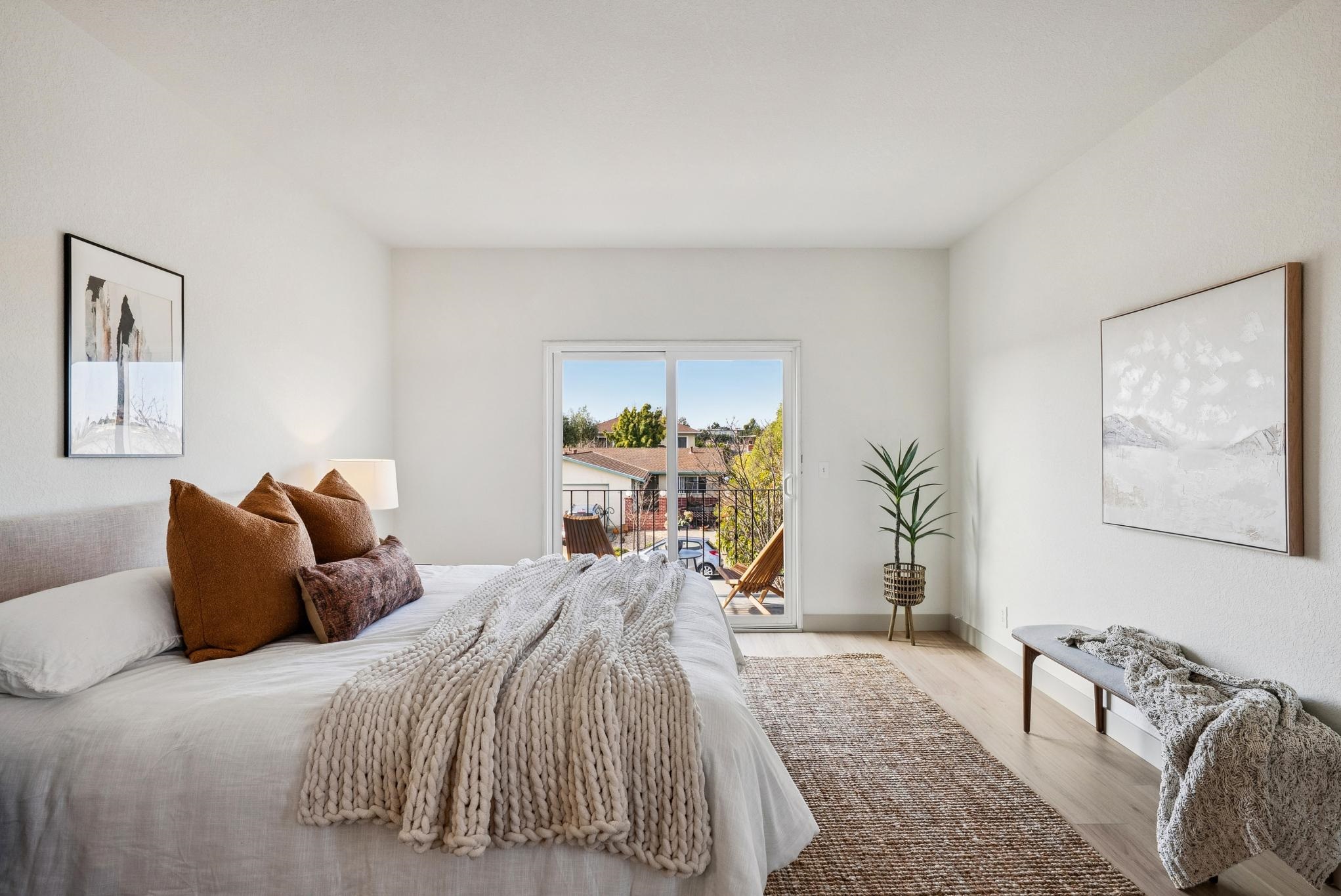 400 Harbor Light Road Alameda, CA 94501 - Photo 35 of 58 a bedroom with a bed and wooden floor