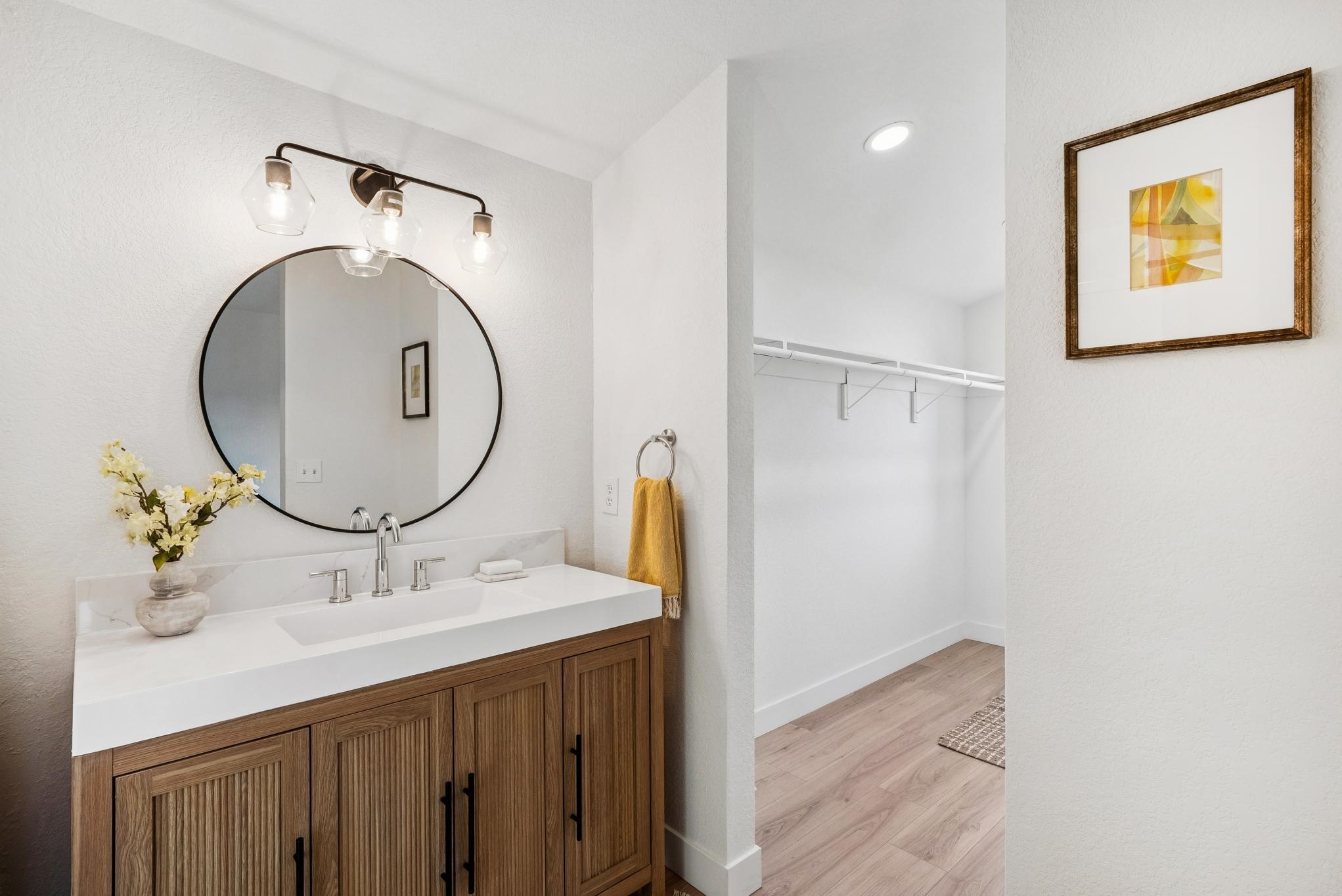 400 Harbor Light Road Alameda, CA 94501 - Photo 37 of 58 a bathroom with a sink and a mirror