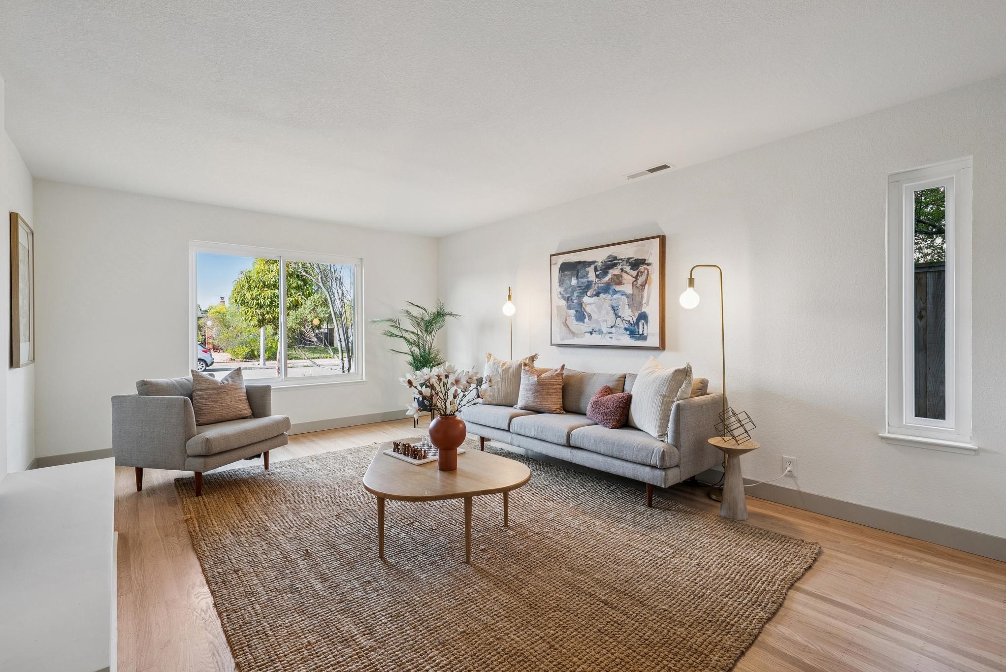400 Harbor Light Road Alameda, CA 94501 - Photo 6 of 58 a living room with furniture and a rug