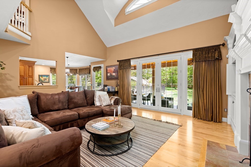 123 Country Way Needham, MA 02492 - Photo 11 of 35 a living room with furniture and a large window