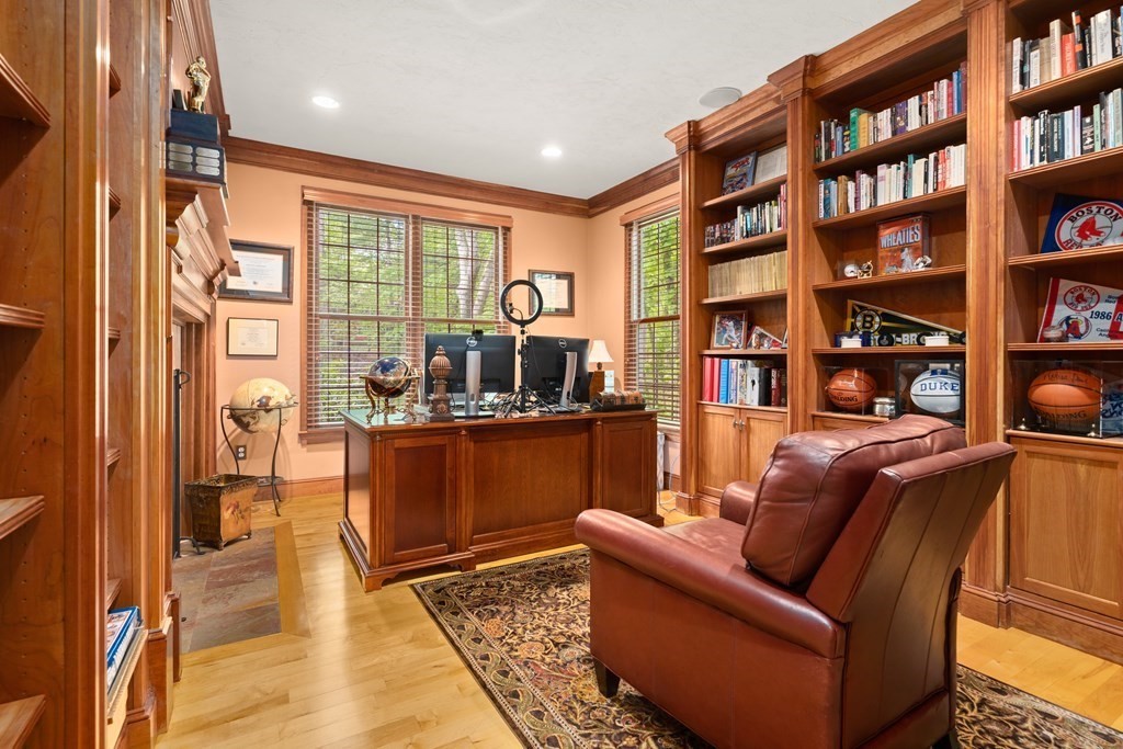 123 Country Way Needham, MA 02492 - Photo 12 of 35 a living room with furniture and a book shelf
