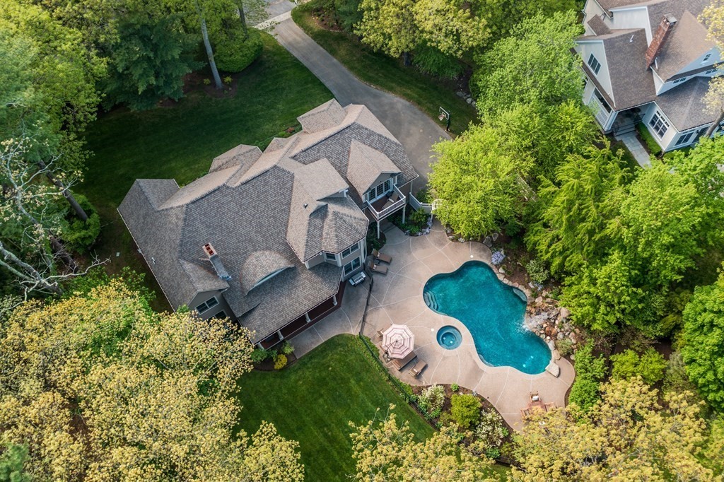 123 Country Way Needham, MA 02492 - Photo 31 of 35 an aerial view of a house with a yard and lake view