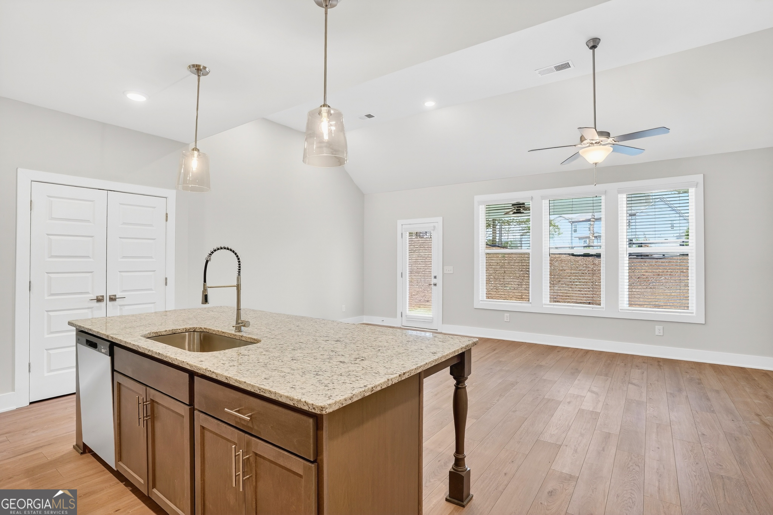214 Villa Rica Springs Villa Rica, GA 30180 - Photo 13 of 33 Expansive center island featuring a thick granite countertop with seating for four