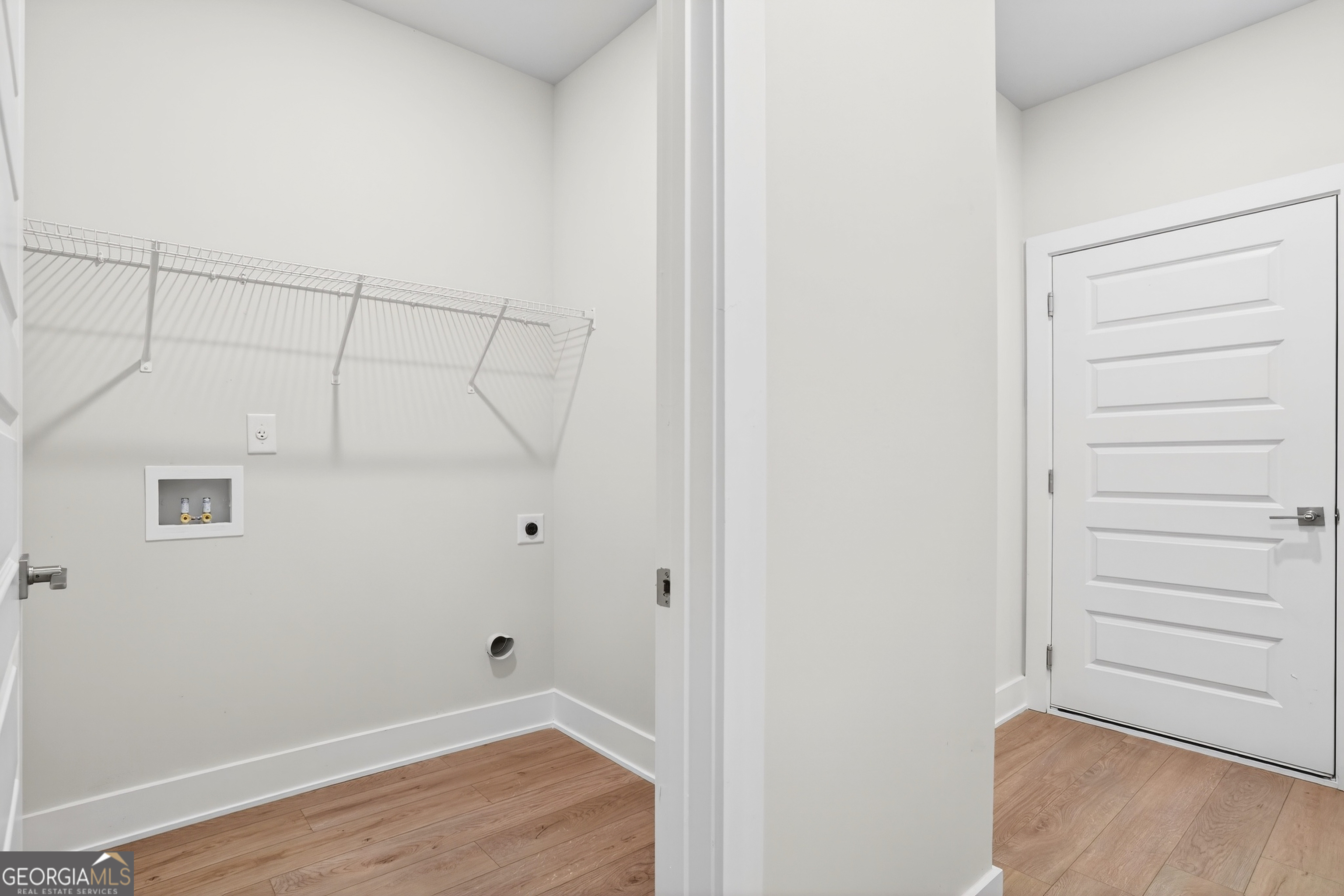 214 Villa Rica Springs Villa Rica, GA 30180 - Photo 15 of 33 Conveniently located laundry room just steps from the primary suite.