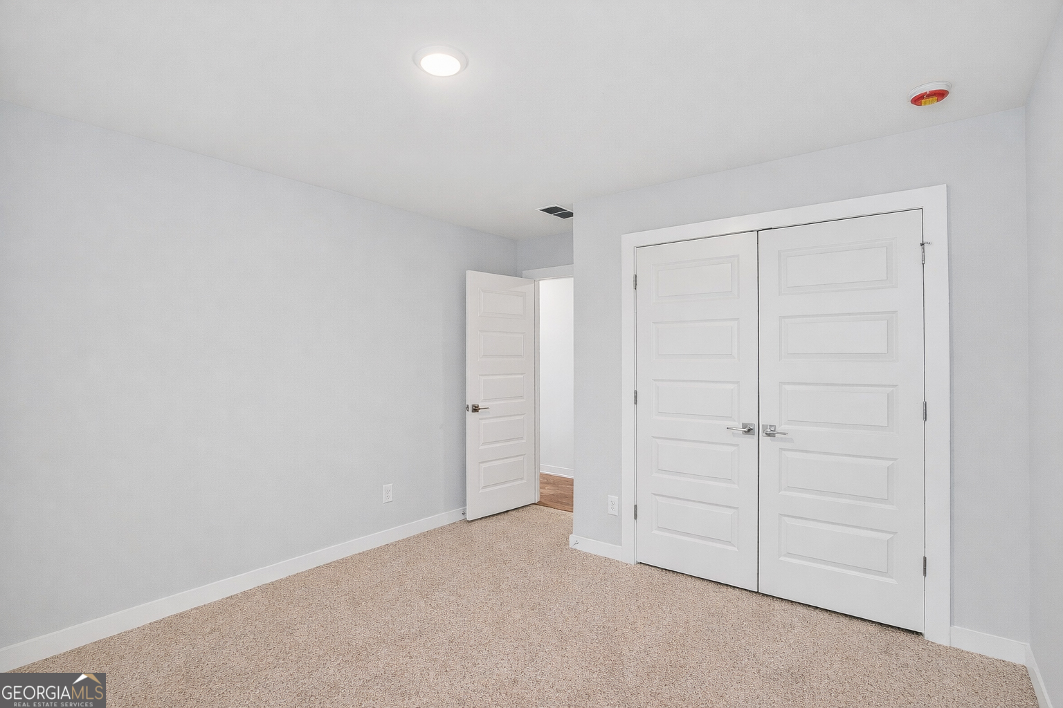 214 Villa Rica Springs Villa Rica, GA 30180 - Photo 25 of 33 Spacious third bedroom upstairs and generous closet space.
