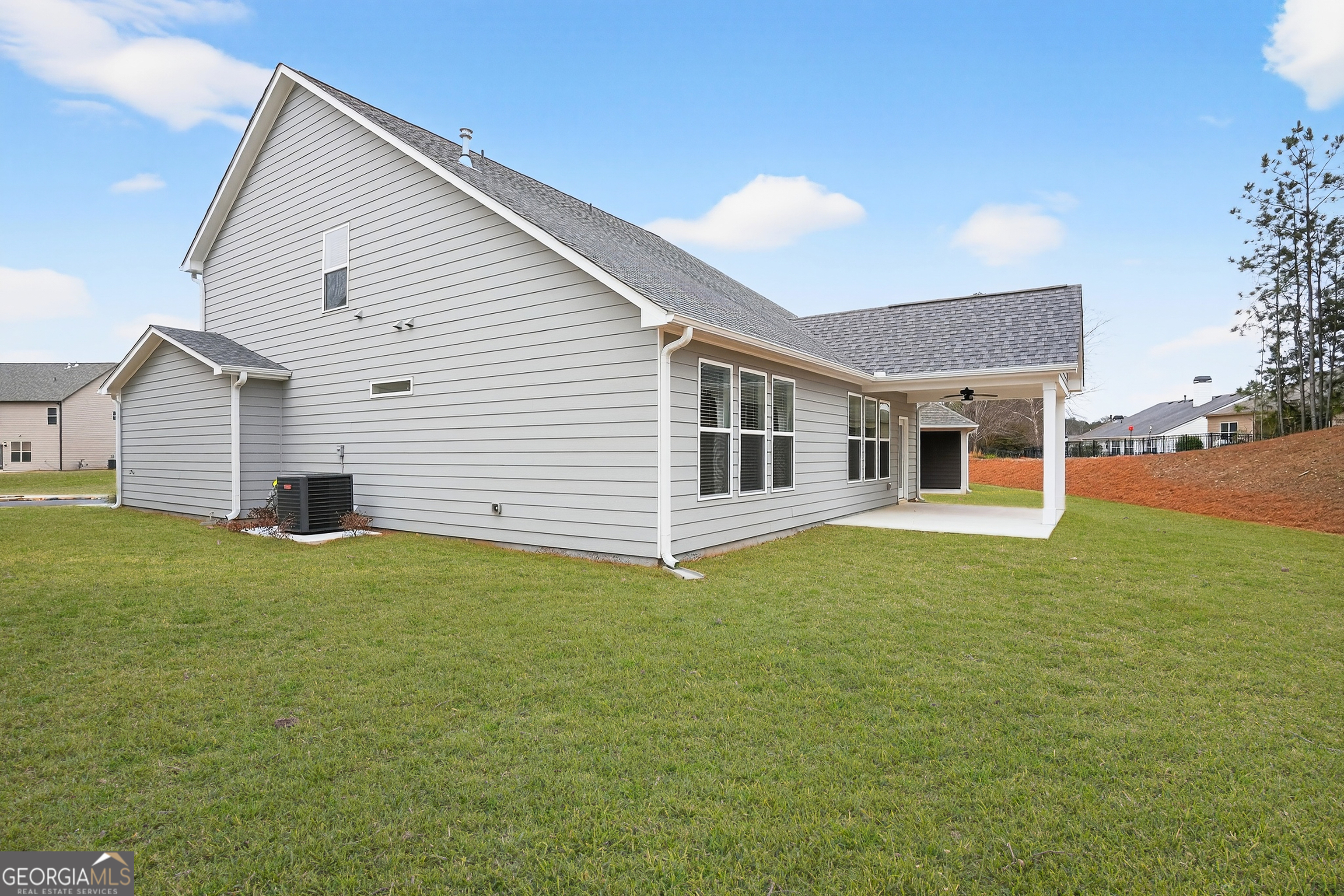214 Villa Rica Springs Villa Rica, GA 30180 - Photo 33 of 33 Spacious, level backyard with covered patio and plenty of room to play or entertain.