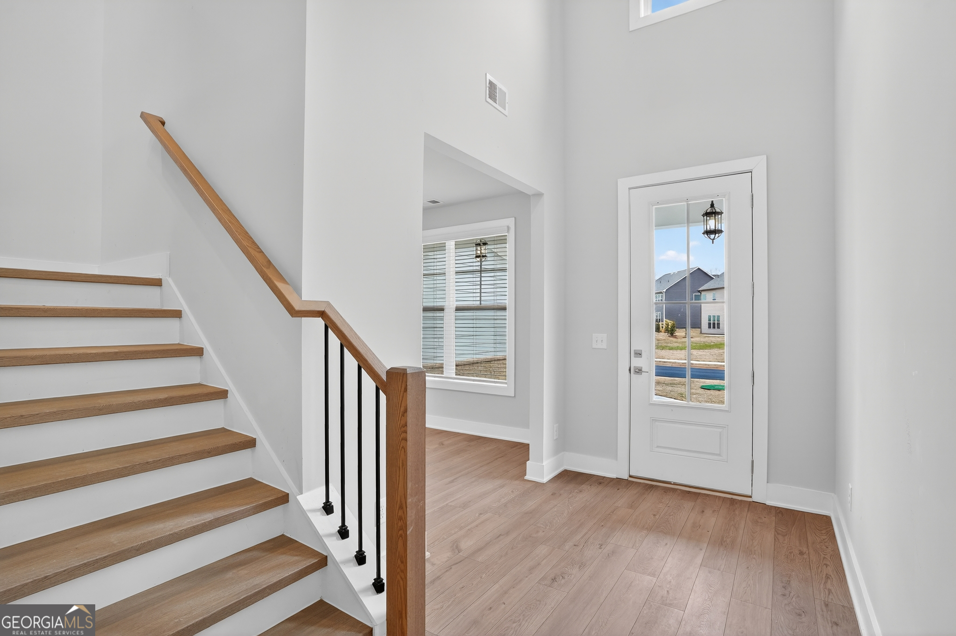 214 Villa Rica Springs Villa Rica, GA 30180 - Photo 5 of 33 Bright, welcoming entry foyer accented with elegant iron stair railings that create an open, airy first impression.