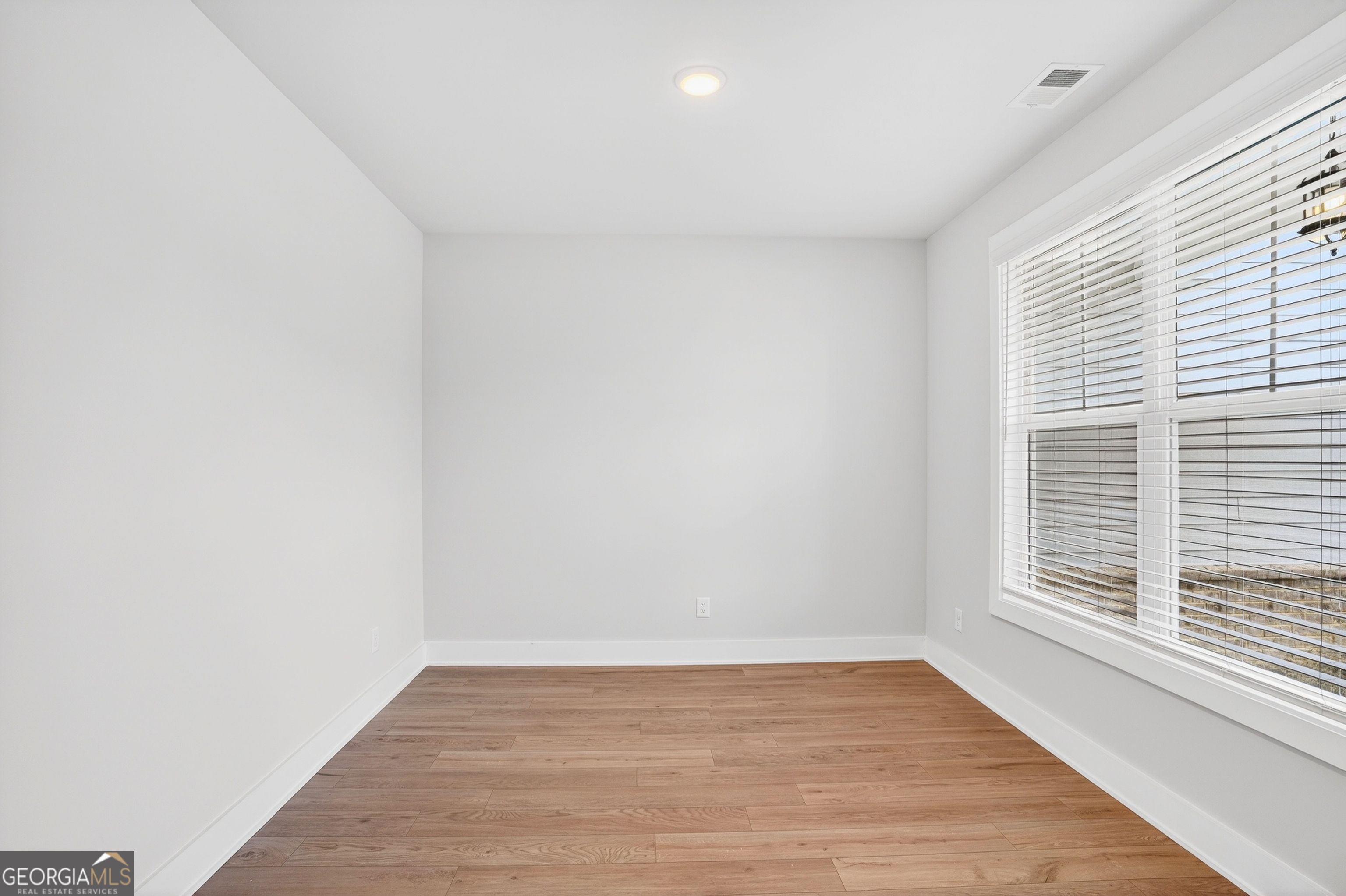 214 Villa Rica Springs Villa Rica, GA 30180 - Photo 7 of 33 Sunlit flex space perfectly suited for a home office or formal dining room.
