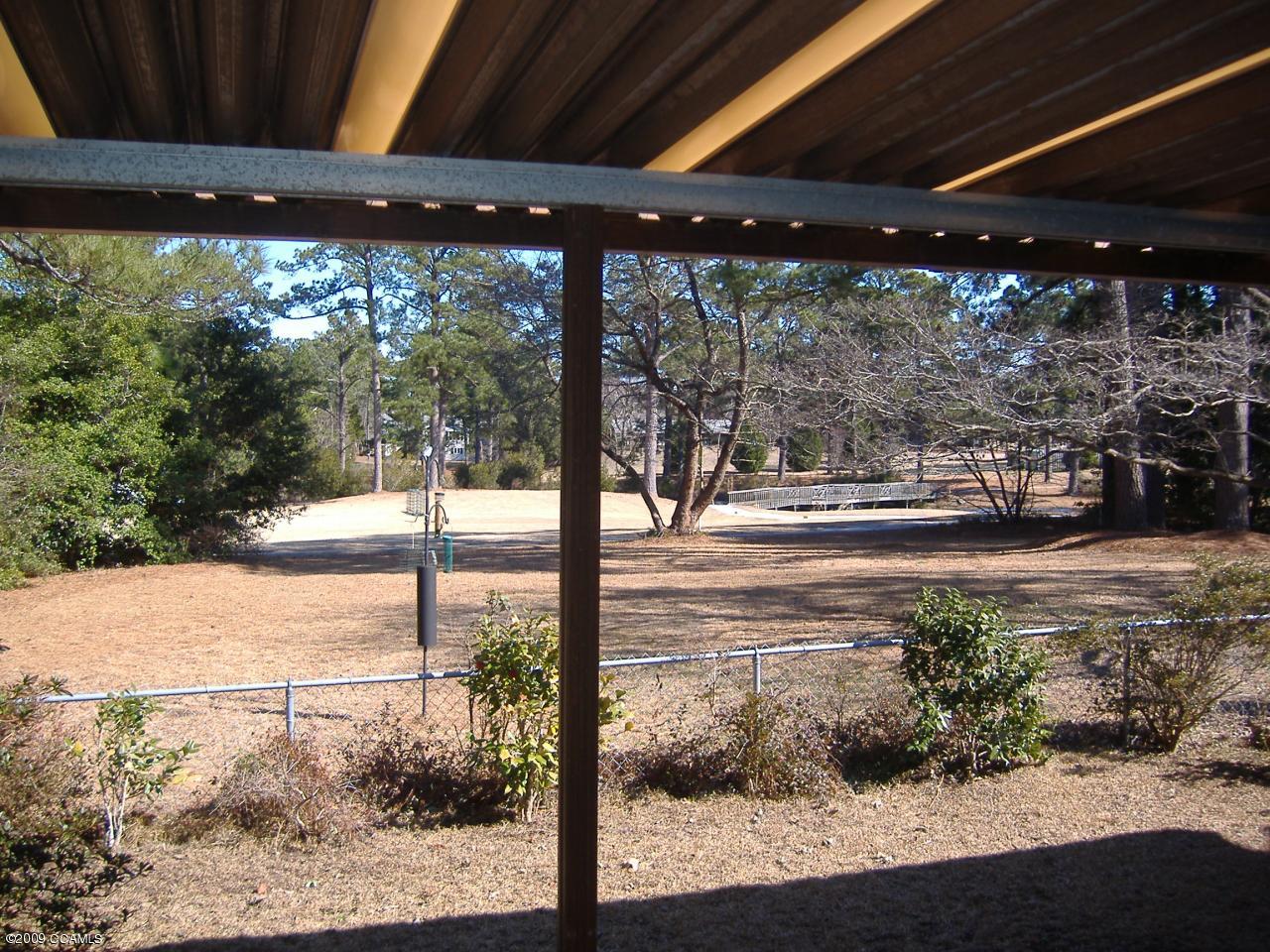 117 Taylor Notion Road, Unit A Swansboro, NC 28584 - Photo 13 of 13 Covered Patio off Living&Master Bedroom