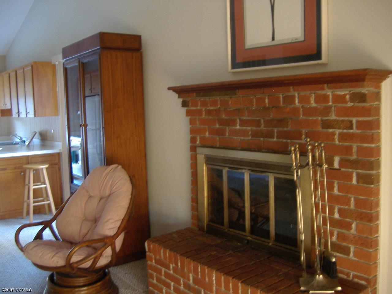 117 Taylor Notion Road, Unit A Swansboro, NC 28584 - Photo 6 of 13 Gas Fireplace in Living Area