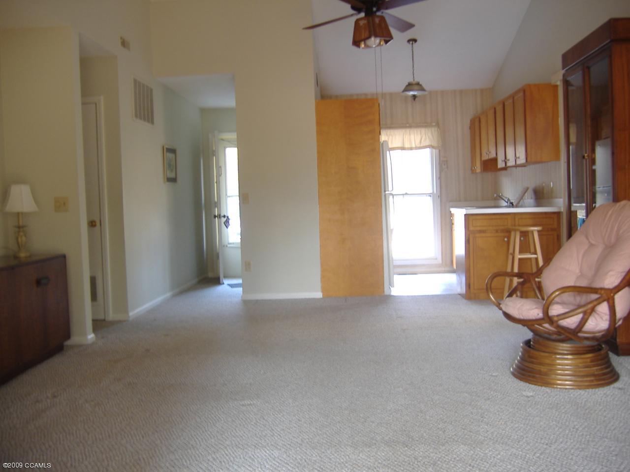 117 Taylor Notion Road, Unit A Swansboro, NC 28584 - Photo 7 of 13 Kitchen off Living Area
