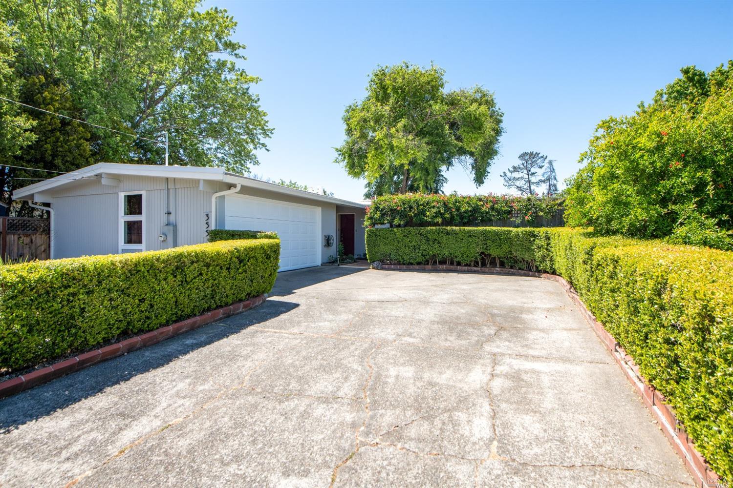 355 Las Colindas Road San Rafael, CA 94903 - Photo 1 of 1 a view of a house with a yard and plants