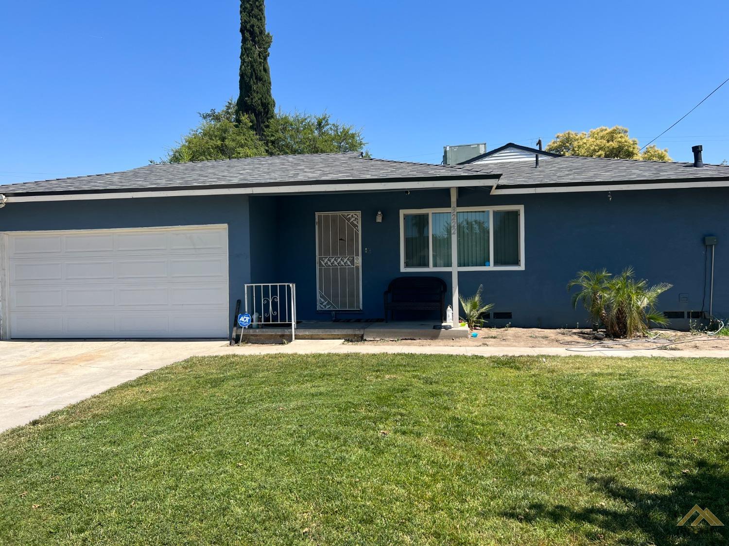 Undisclosed Address Bakersfield, CA 93304 - Photo 2 of 2 a house view with a garden space
