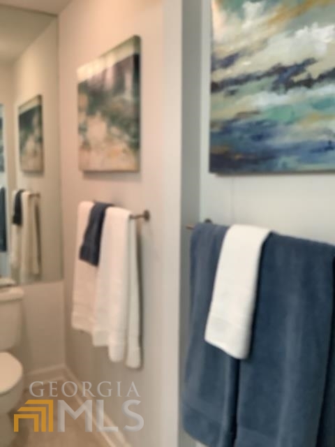 3097 Colonial Way, Unit M Chamblee, GA 30341 - Photo 10 of 11 a bathroom with a shower and toilet