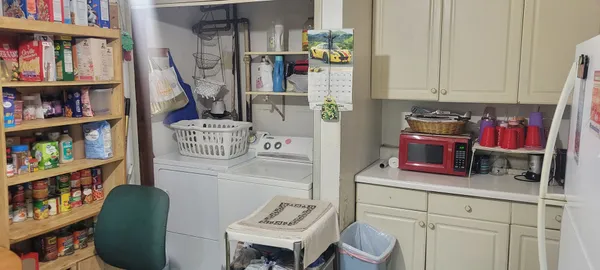 a bathroom with a shower curtain and a mirror