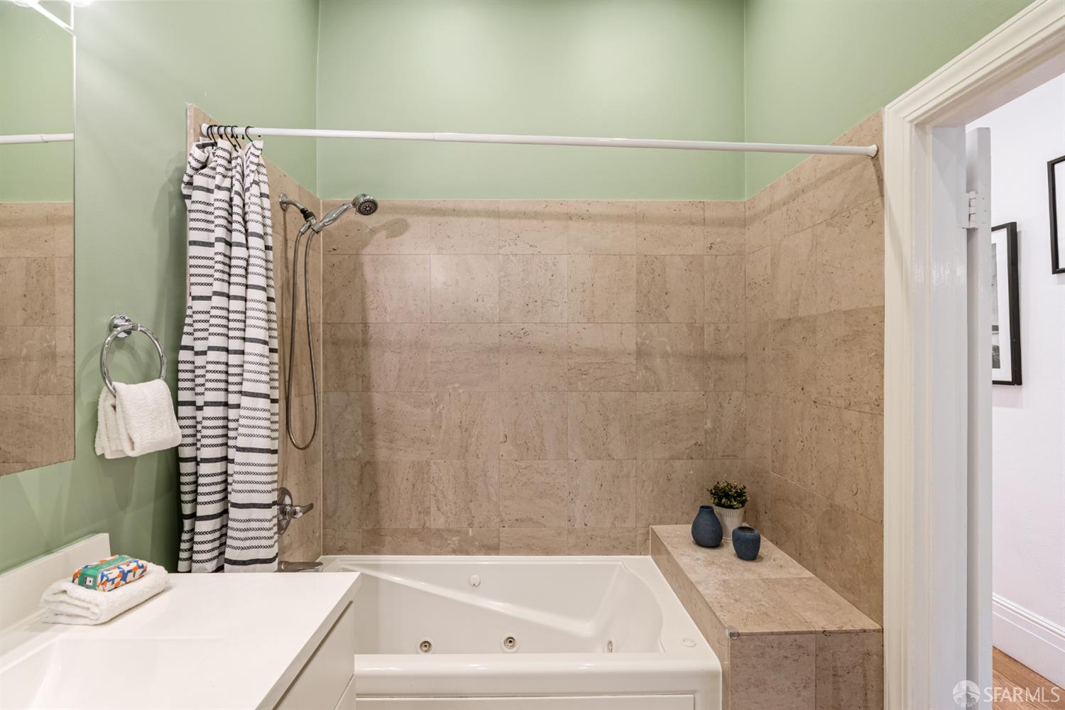 223 Sanchez Street San Francisco, CA 94114 - Photo 12 of 27 a bathroom with a bathtub and shower
