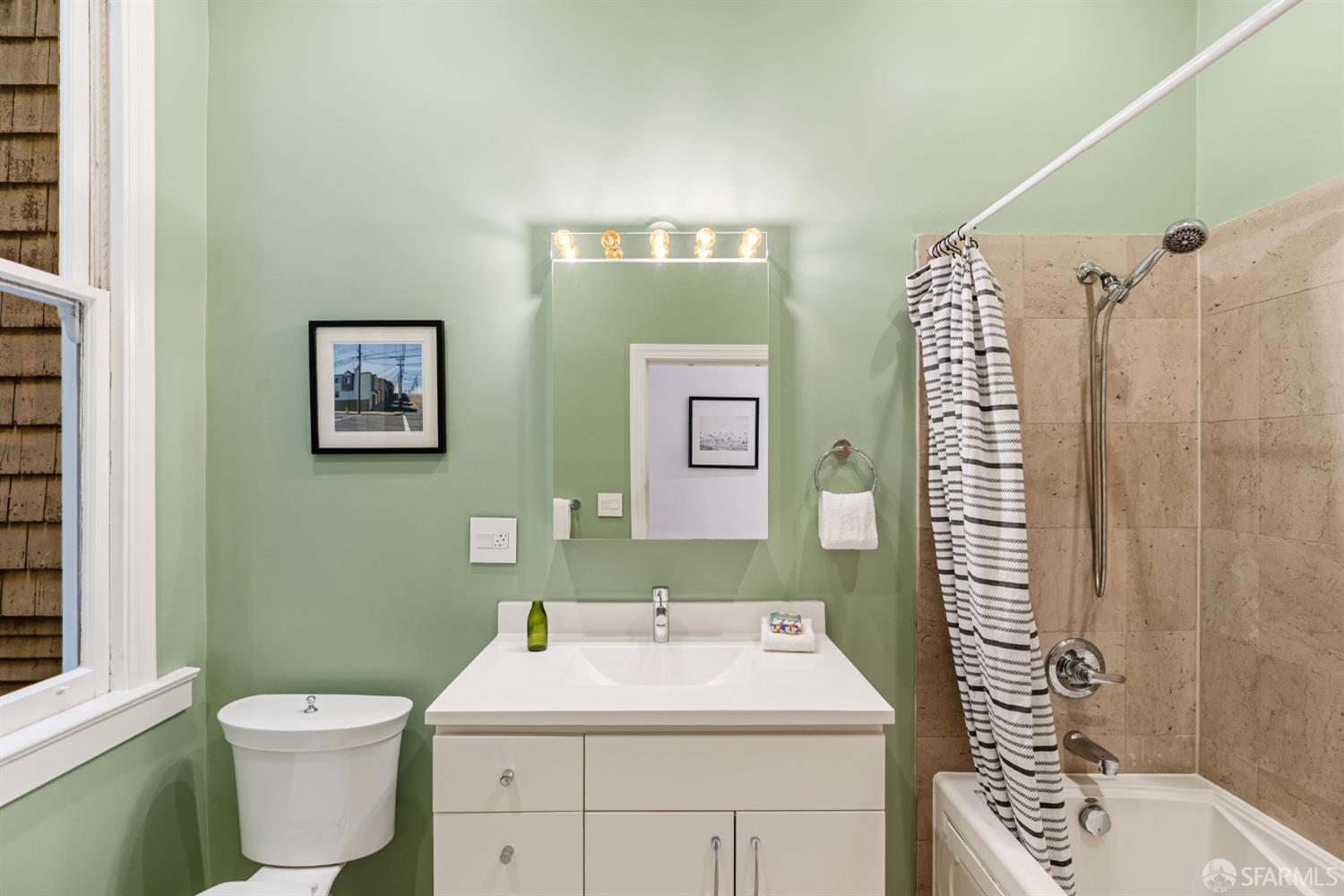 223 Sanchez Street San Francisco, CA 94114 - Photo 13 of 27 a bathroom with a sink toilet and shower