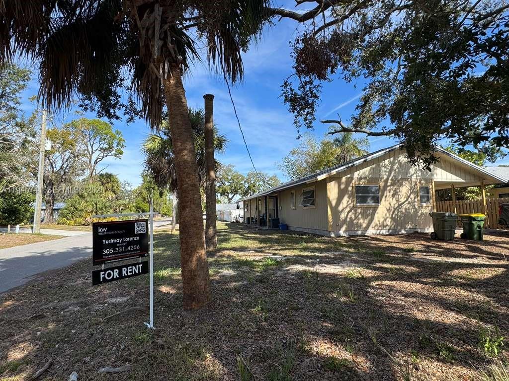 5100 Rilma Avenue Sarasota, FL 34234 - Photo 17 of 18 a view of a outdoor space with a tree