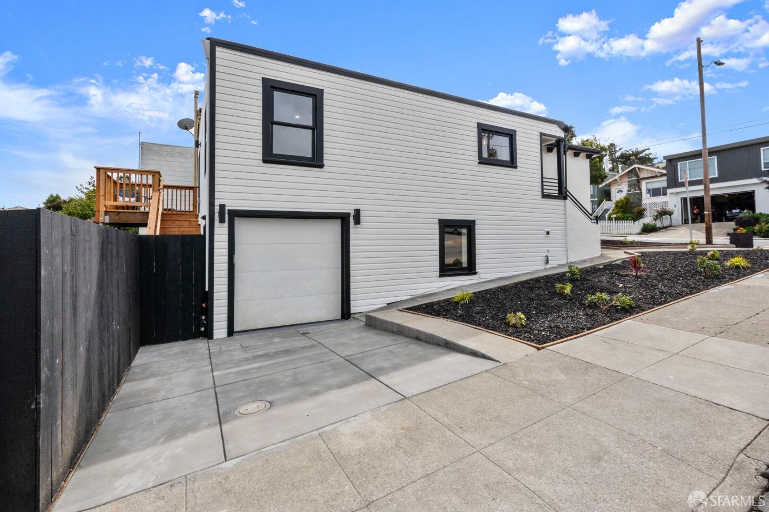 348 Edna Street San Francisco, CA 94112 - Photo 2 of 45 a view of a house with backyard