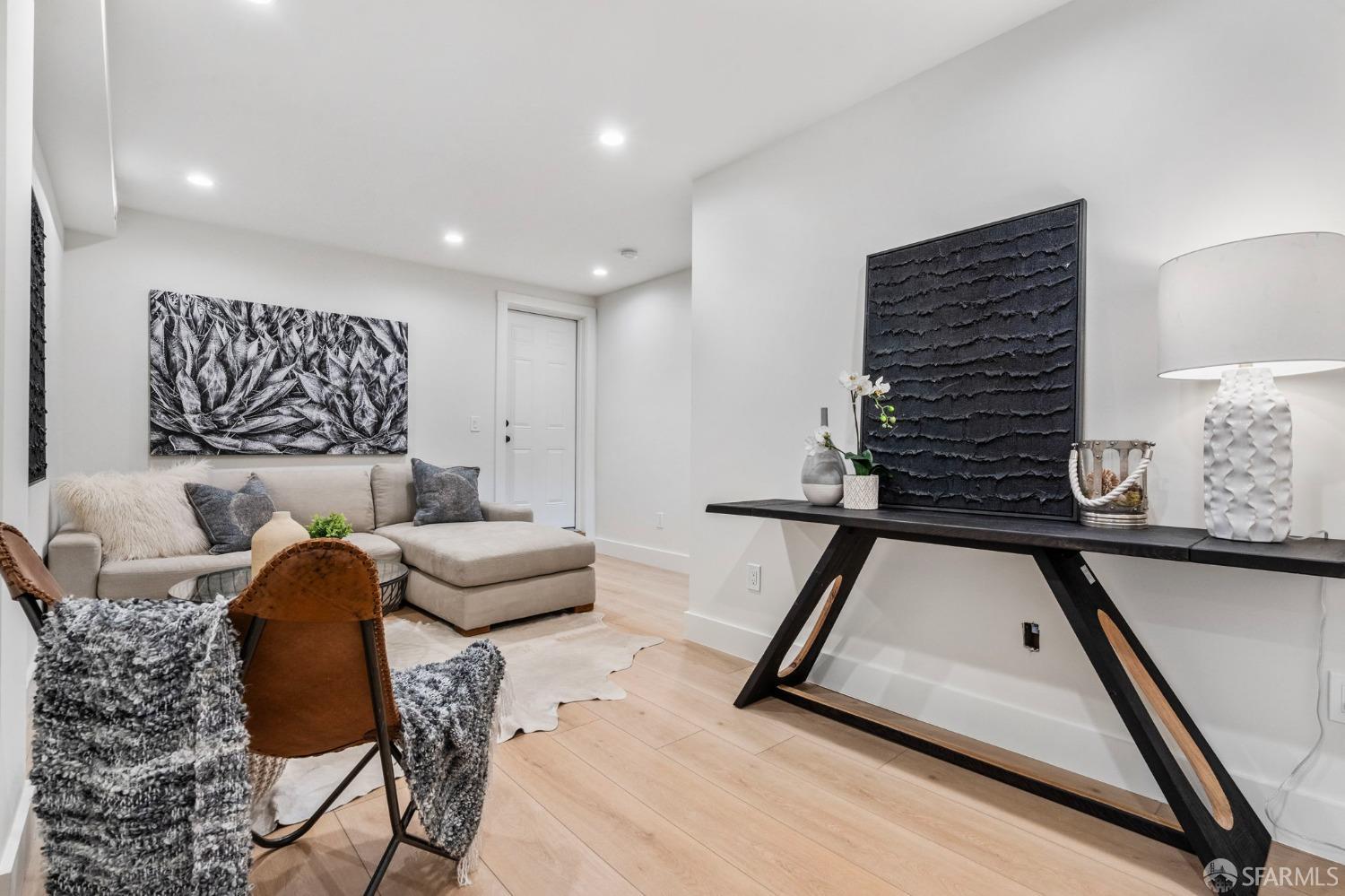 348 Edna Street San Francisco, CA 94112 - Photo 22 of 45 a living room with furniture and a couch