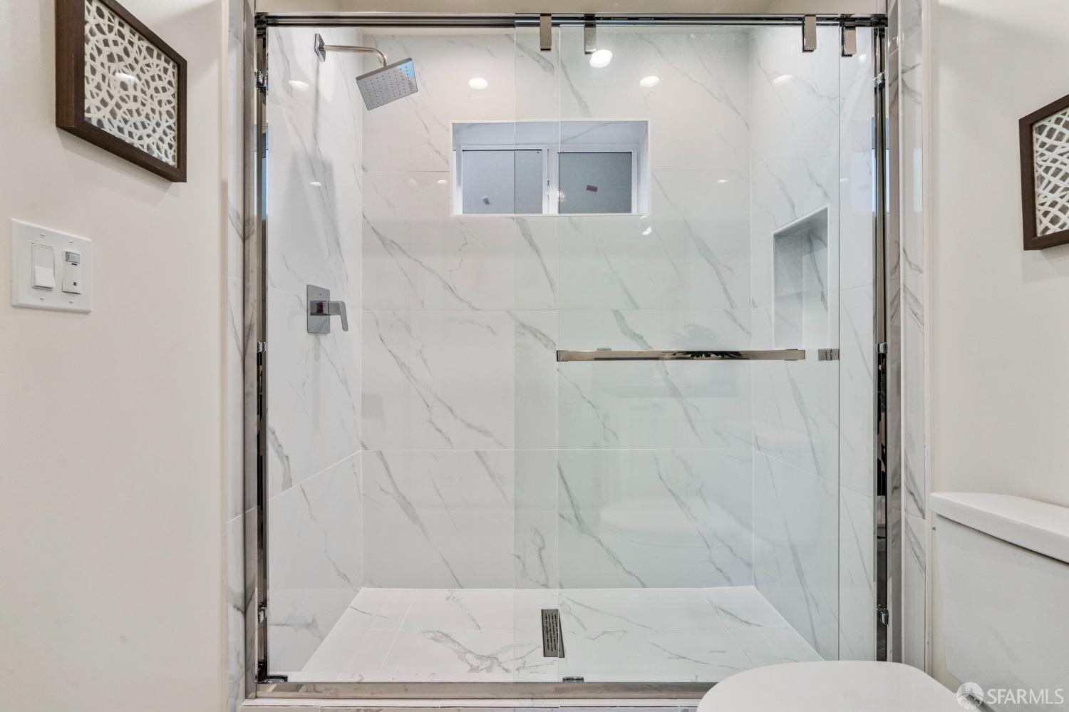 348 Edna Street San Francisco, CA 94112 - Photo 28 of 45 a bathroom with a shower and a sink