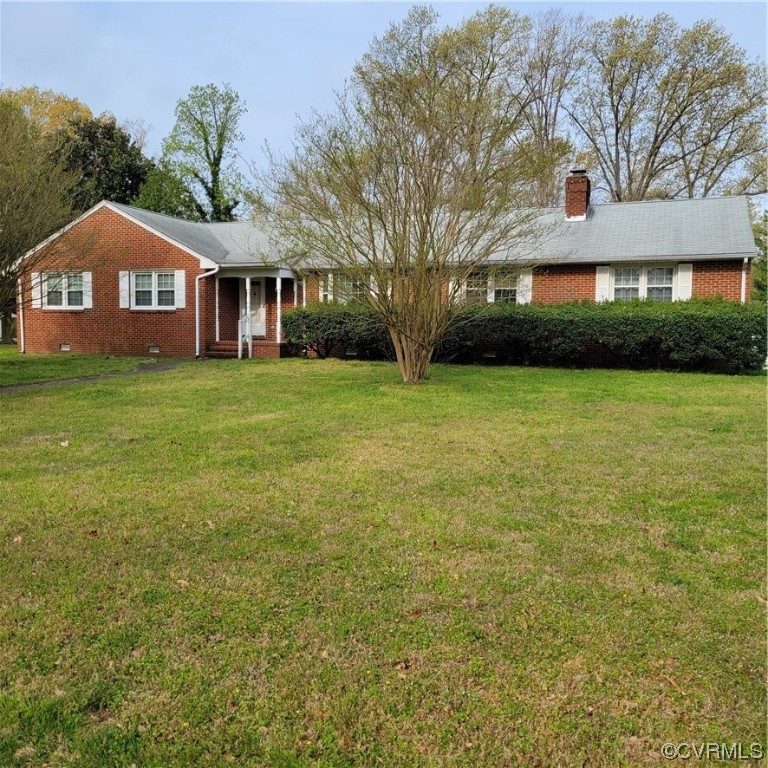 12500 Easy Street Chester, VA 23831 - Photo 1 of 5 a front view of a house with a yard
