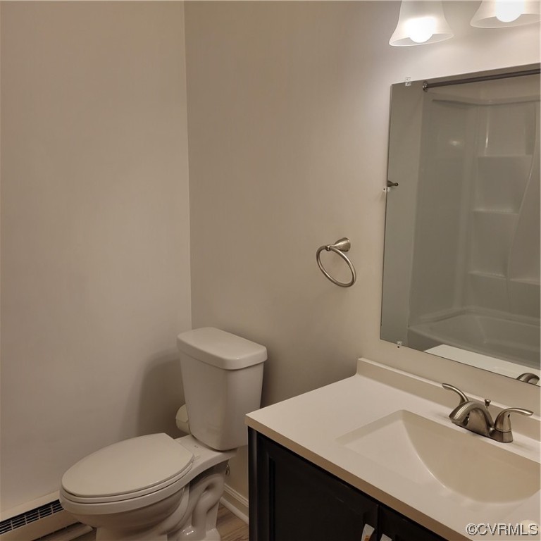 12500 Easy Street Chester, VA 23831 - Photo 5 of 5 a white toilet sitting next to a bathroom sink
