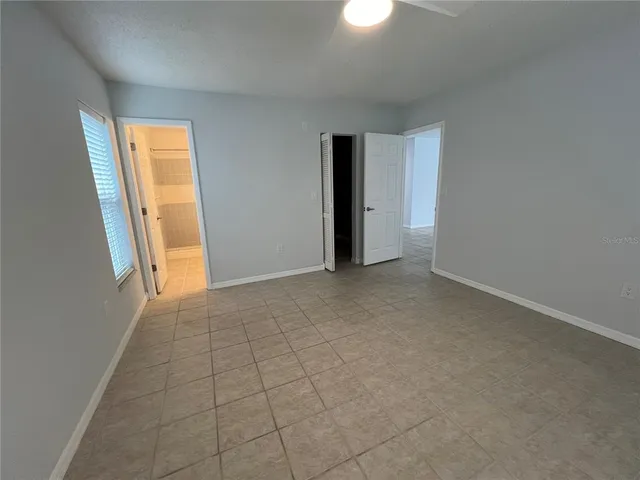 an empty room with window