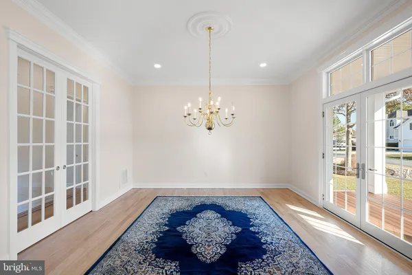 a living room with a rug