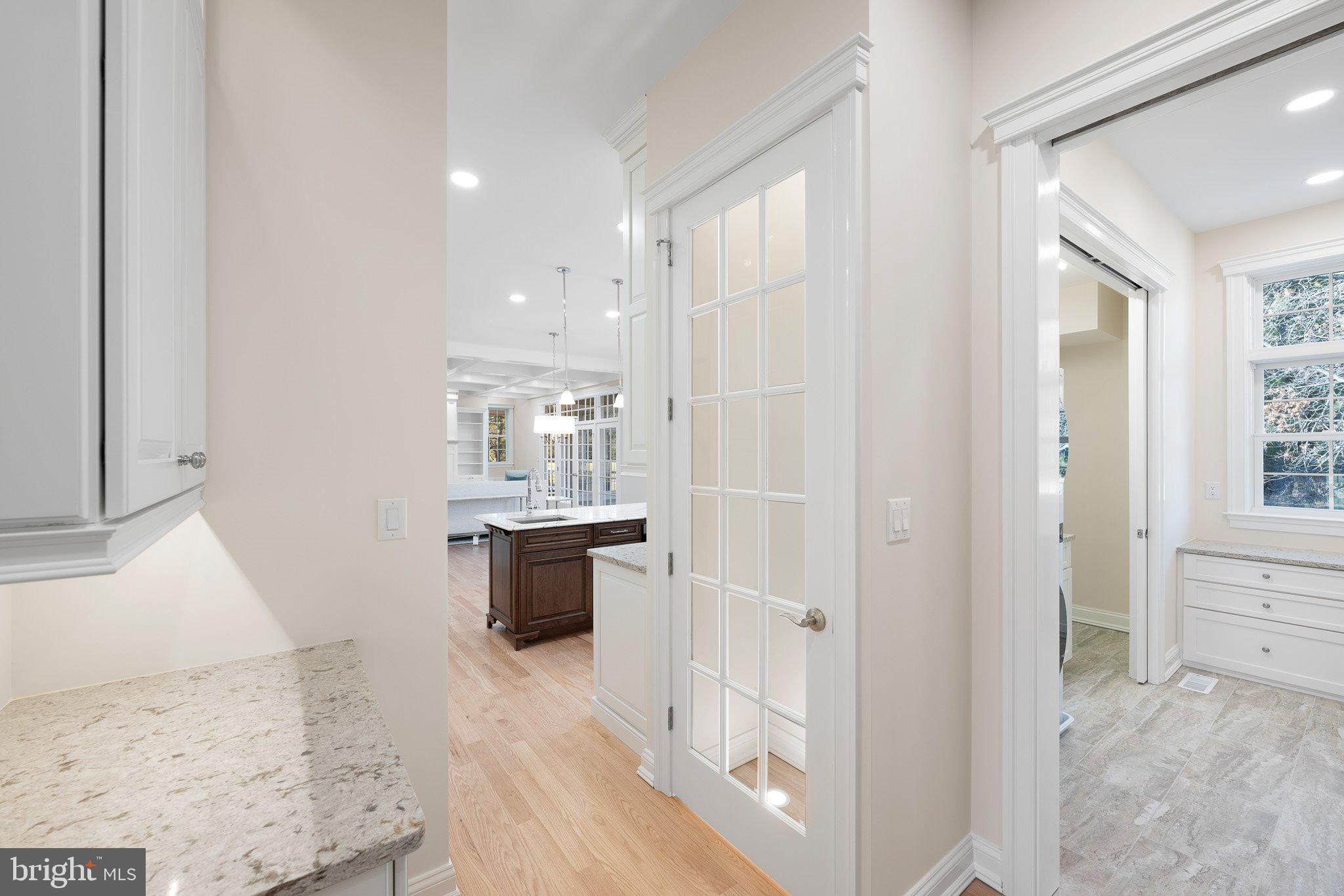 403 Canal Way East Bethany Beach, DE 19930 - Photo 19 of 51 a bathroom with a tub sink and mirror