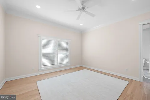 a view of a bathroom with a tub and shower