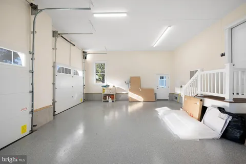 an aerial view of a house with a ocean view