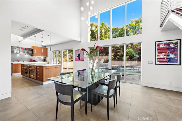 a view of a kitchen and dining area