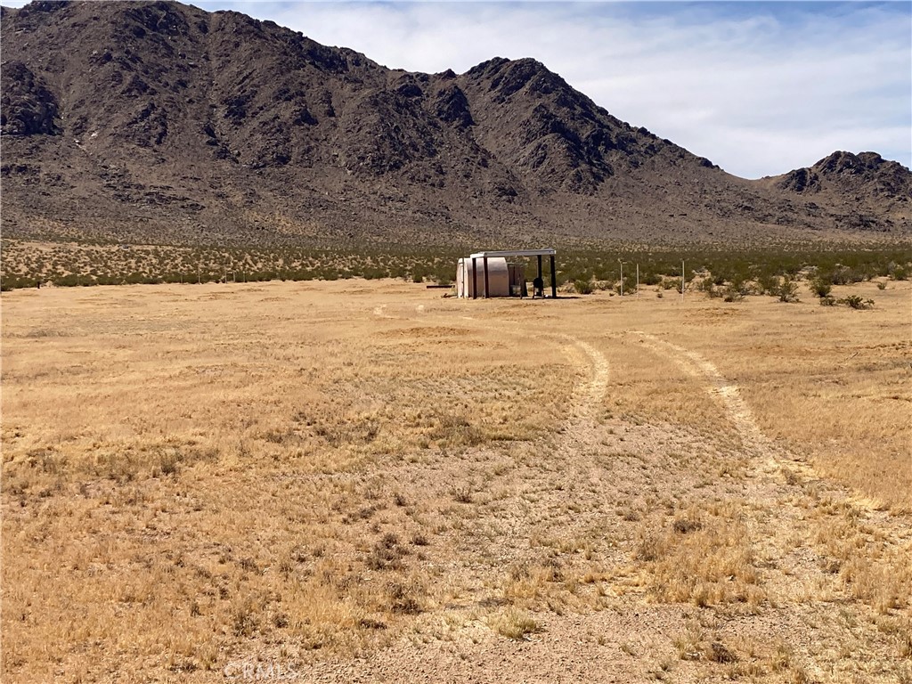 0 Barstow Road Lucerne Valley, CA 92356 - Photo 8 of 16 a view of a house with a yard