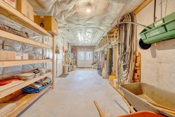 a view of a room with stairs and a couch