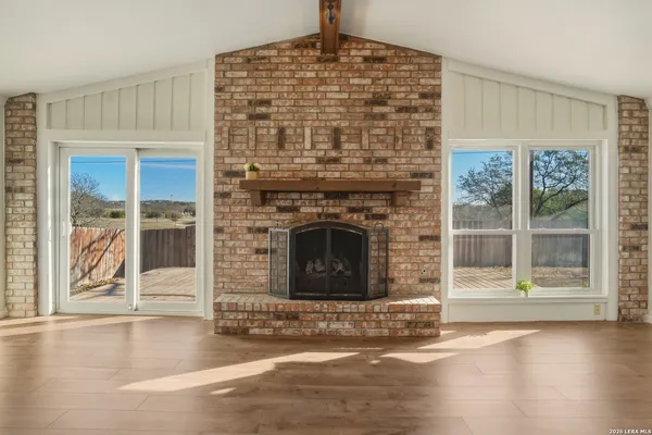 a kitchen with stainless steel appliances granite countertop a stove and a refrigerator