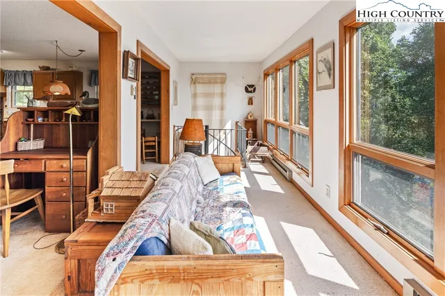 a view of a living room with furniture