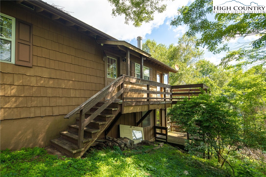2811 Georges Gap Road Vilas, NC 28692 - Photo 2 of 39 a view of a house with a yard