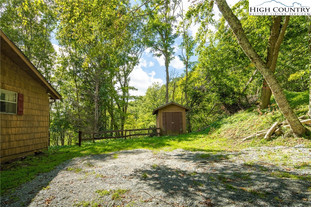 2811 Georges Gap Road Vilas, NC 28692 - Photo 25 of 39 a view of a back yard of the house