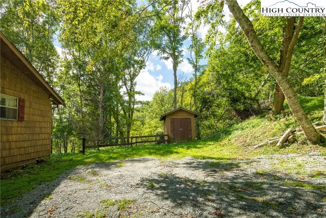 a view of a back yard of the house